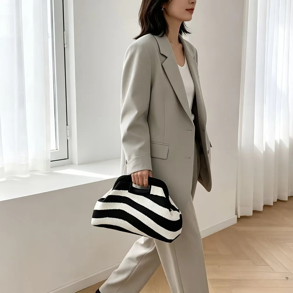 Nuova borsa intrecciata traforata a righe, borsa a mano in maglia, versatile borsa portatile per cosmetici