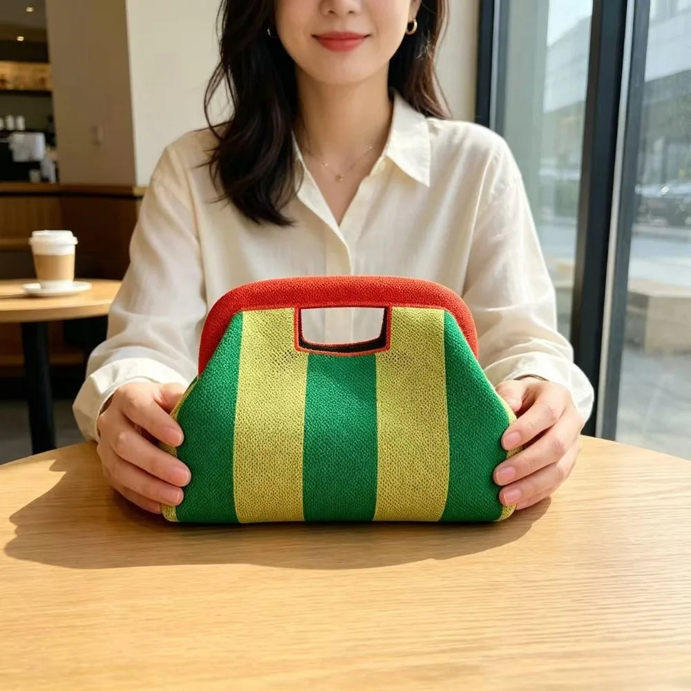 Nuova borsa intrecciata traforata a righe, borsa a mano in maglia, versatile borsa portatile per cosmetici