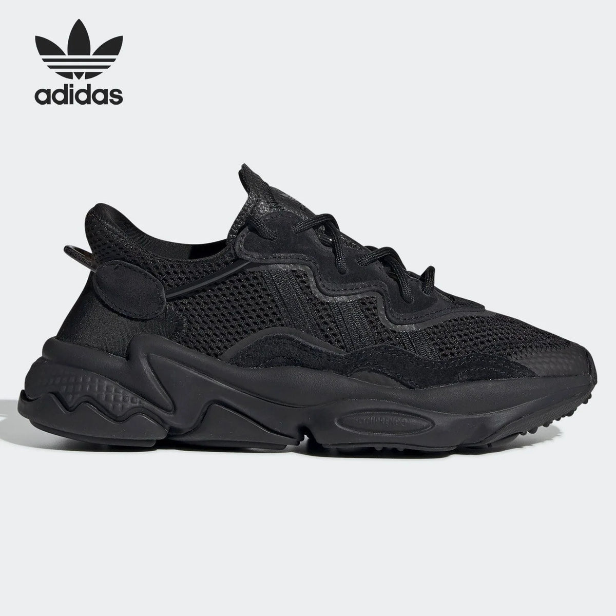 Adidas Originals OZWEEGO 'Black Warrior', sneakers casual retrò in rete, modello interamente nero, EE7775.
