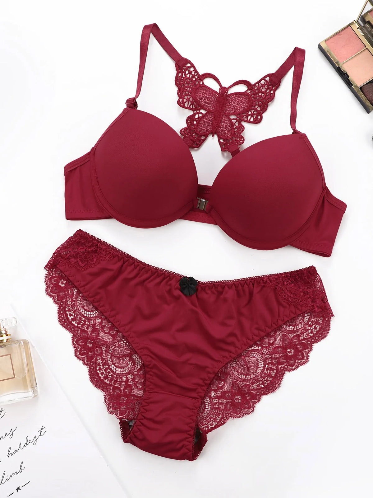 Set da 2 pezzi di vendita caldo di reggiseno rosso sexy con bottoni frontali bellissimo reggiseno moda farfalla posteriore push up set da donna A2120