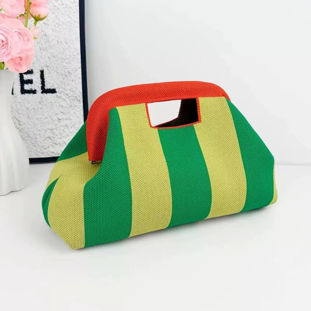 Nuova borsa intrecciata traforata a righe, borsa a mano in maglia, versatile borsa portatile per cosmetici