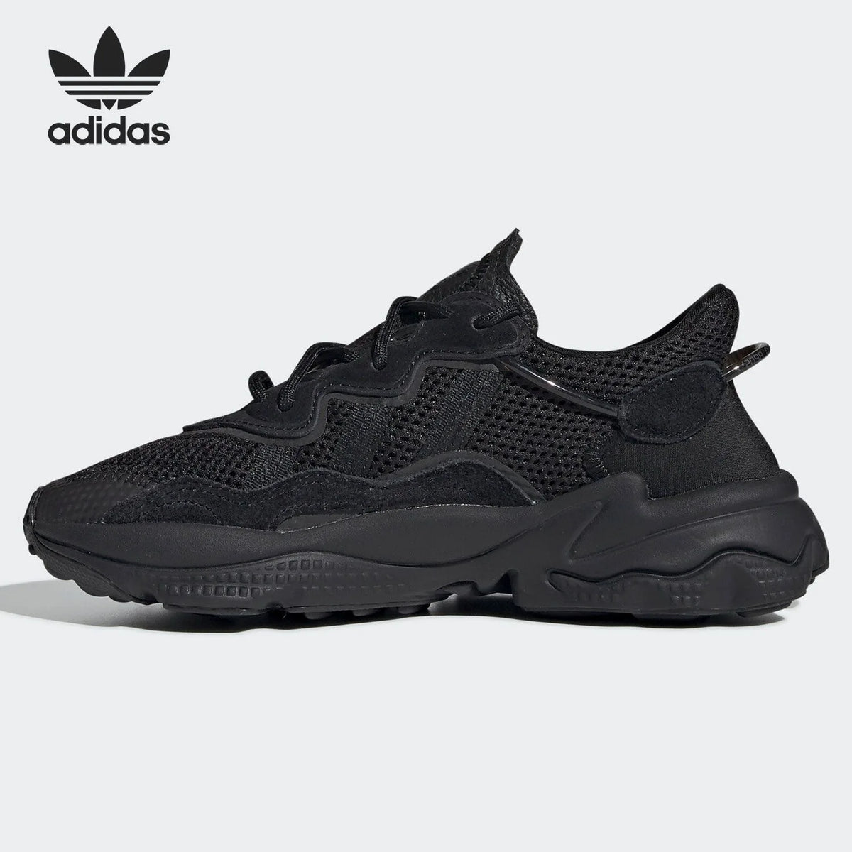 Adidas Originals OZWEEGO 'Black Warrior', sneakers casual retrò in rete, modello interamente nero, EE7775.