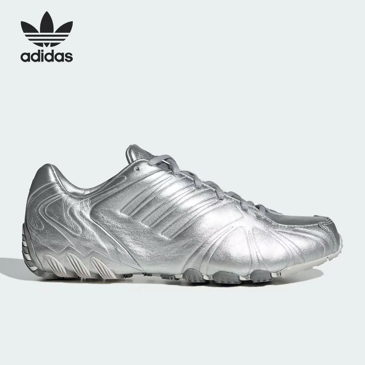 Sneakers vintage alla moda Adidas Retro con motivo a conchiglia, nere con cuciture bianche e suola in gomma IH1654