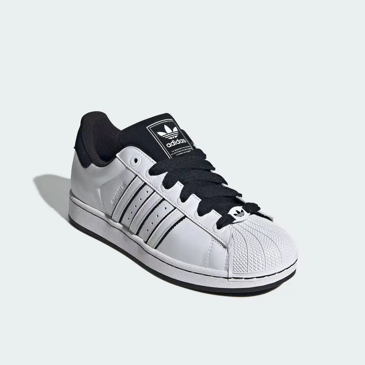 Sneakers classiche adidas Originals Shell Toe bianche e nere con colorblock, scarpe sportive casual KI9521