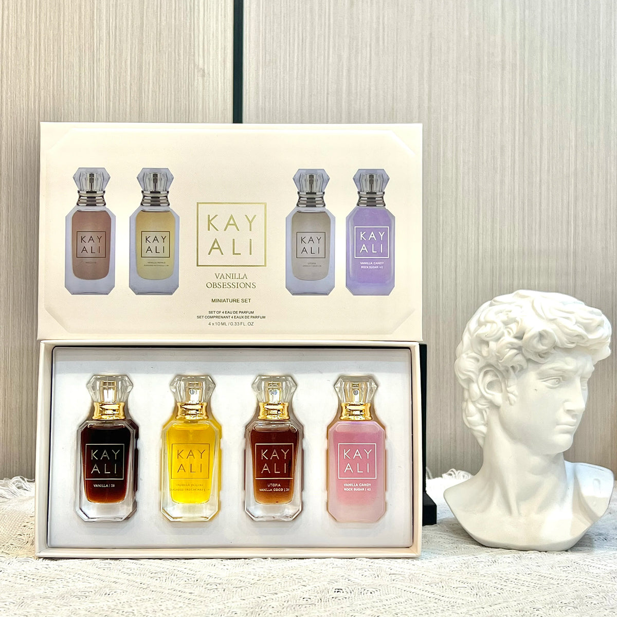 KAYALI Set di 4 Mini Profumi da 10ml, Fragranze Vaniglia, Oud, Floreali, Fruttate, Orientali, Lunga Durata, Unisex, Eau De Parfum, Set da Viaggio di Lusso