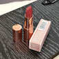 Charlotte, lucidalabbra al gusto di frutta, blush in polvere colorata, stick, tubetto rosa e oro, rossetto facile da applicare, Tilbury Cosmetics.