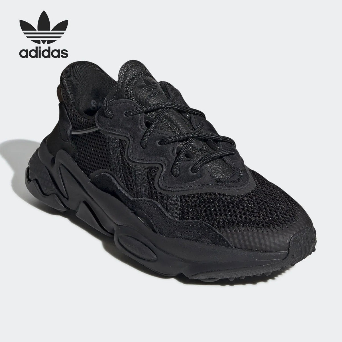 Adidas Originals OZWEEGO 'Black Warrior', sneakers casual retrò in rete, modello interamente nero, EE7775.
