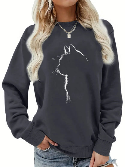 Maglione da donna, ideale per l’autunno e l’inverno, dal taglio ampio e confortevole, con stampa a motivi felini, scollo rotondo e maniche lunghe.