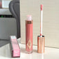 Charlotte, lucidalabbra al gusto di frutta, blush in polvere colorata, stick, tubetto rosa e oro, rossetto facile da applicare, Tilbury Cosmetics.