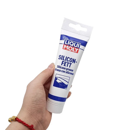 Liqui Moly 3312 Grasso Siliconico 100g, Lubrificante Dielettrico Trasparente per Guide Tettuccio Apribile, Binari Sedili, Cerniere Porte, Guarnizioni in Gomma