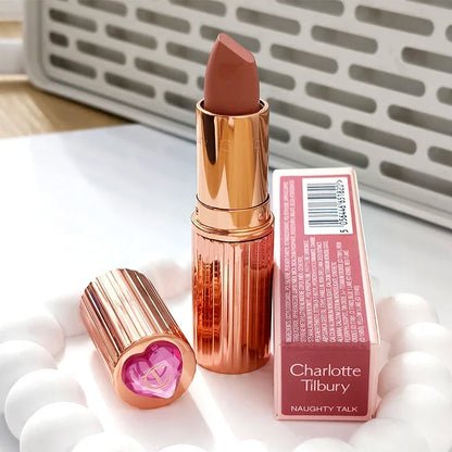 Charlotte, lucidalabbra al gusto di frutta, blush in polvere colorata, stick, tubetto rosa e oro, rossetto facile da applicare, Tilbury Cosmetics.