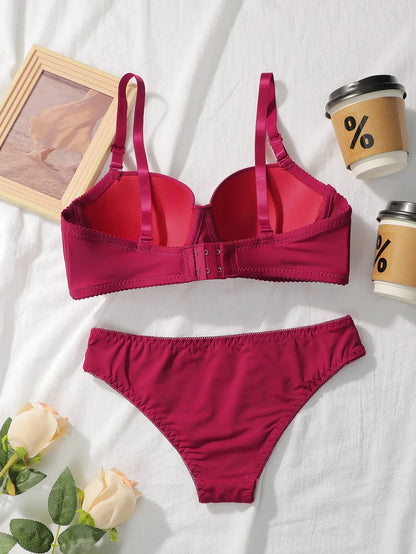 Nuovo set da 2 pezzi quotidiano in tinta unita di vendita calda con reggiseno push up con bordo in acciaio per set intimo donna J2611