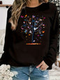 Maglione da donna, ideale per l’autunno e l’inverno, dal taglio ampio e confortevole, caldo, con stampa a motivi di farfalle e alberi, scollo rotondo e maniche lunghe.