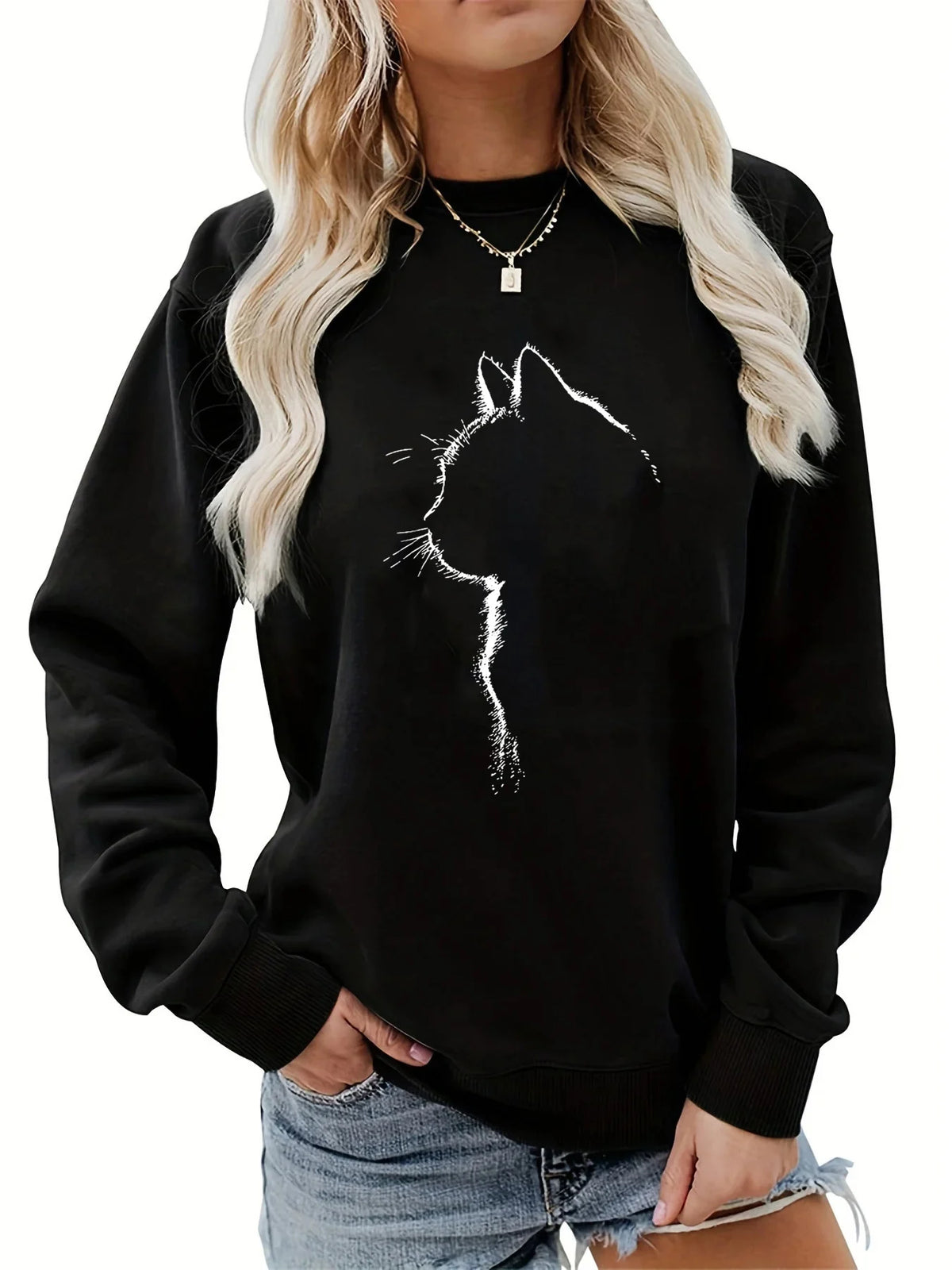 Maglione da donna, ideale per l’autunno e l’inverno, dal taglio ampio e confortevole, con stampa a motivi felini, scollo rotondo e maniche lunghe.