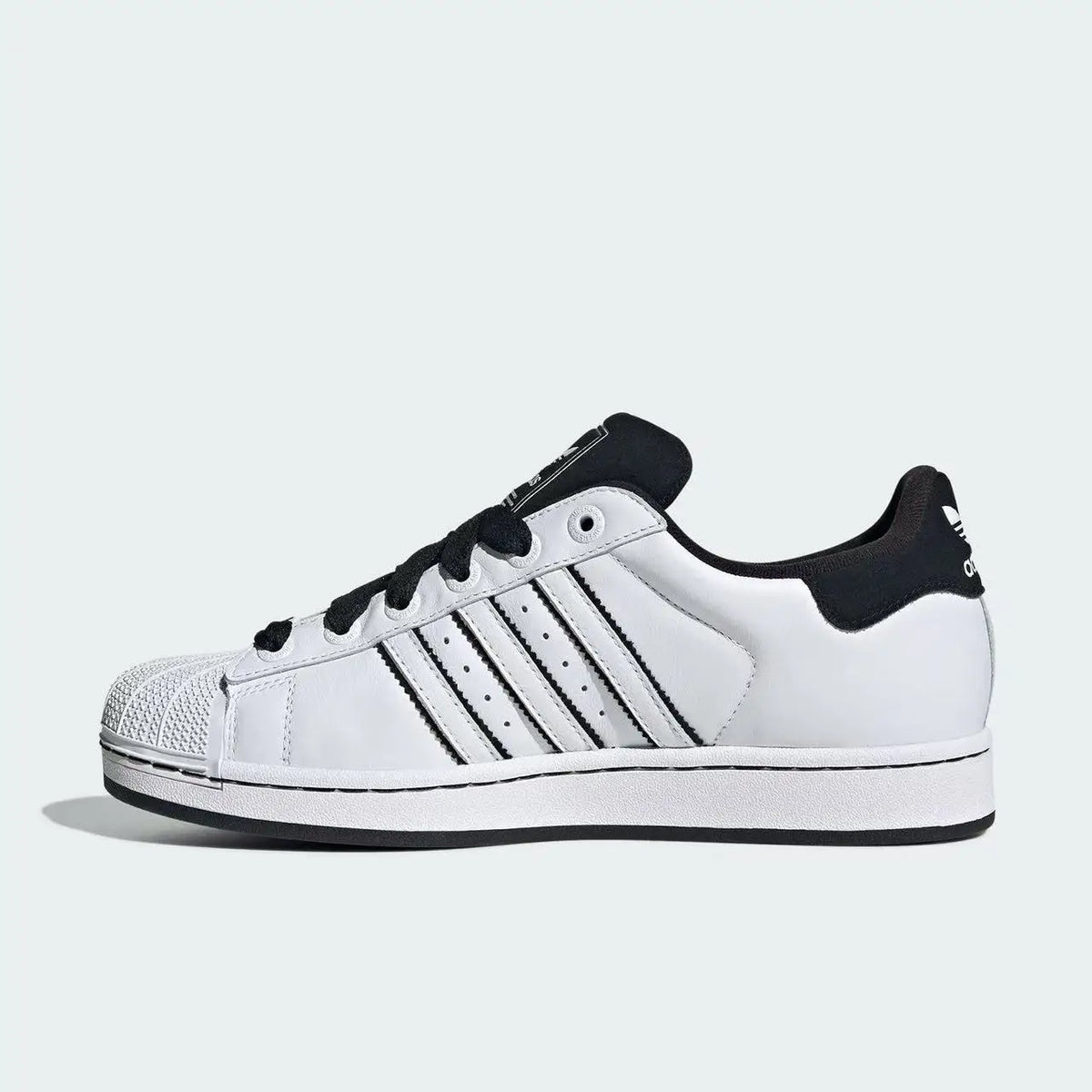 Sneakers classiche adidas Originals Shell Toe bianche e nere con colorblock, scarpe sportive casual KI9521