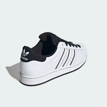 Sneakers classiche adidas Originals Shell Toe bianche e nere con colorblock, scarpe sportive casual KI9521