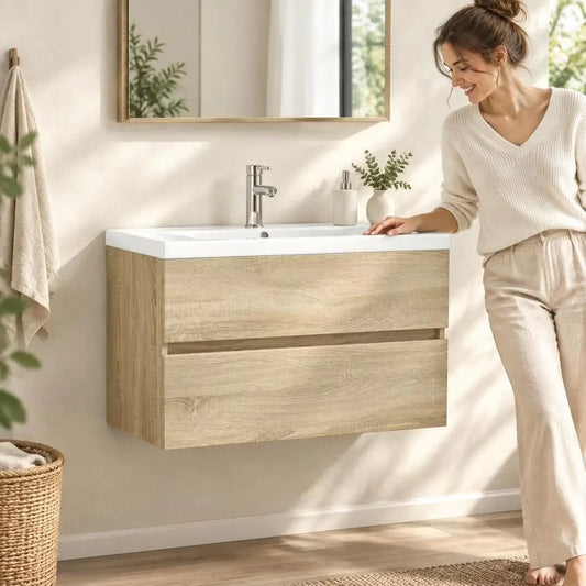 Set da bagno da parete con lavabo in ceramica e mobile in legno, unità di stoccaggio salvaspazio, design moderno per piccoli bagni e toilette.