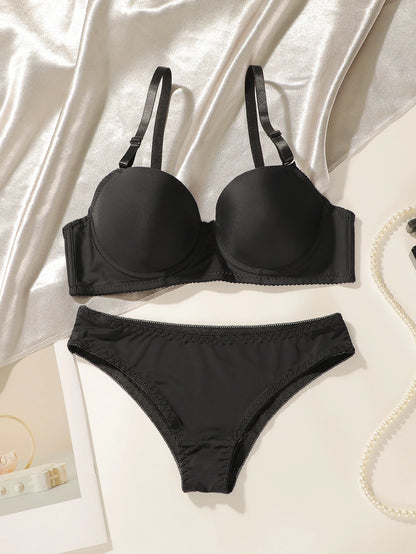 Nuovo set da 2 pezzi quotidiano in tinta unita di vendita calda con reggiseno push up con bordo in acciaio per set intimo donna J2611