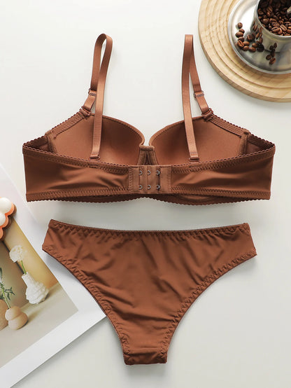 Nuovo set da 2 pezzi quotidiano in tinta unita di vendita calda con reggiseno push up con bordo in acciaio per set intimo donna J2611