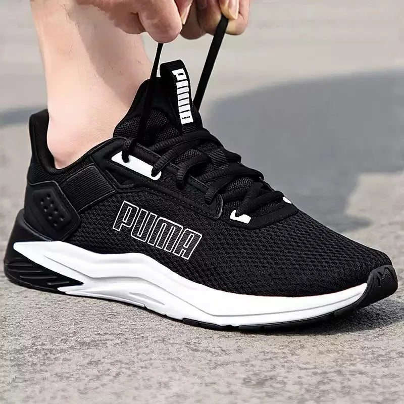 PUMA Sneakers da Corsa Leggere e Traspiranti con Logo Grande Bianco e Nero 311095-01