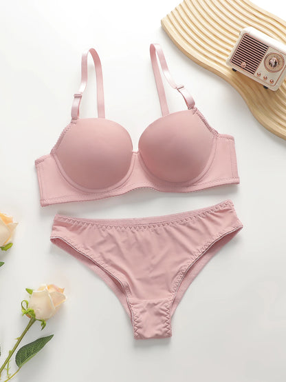 Nuovo set da 2 pezzi quotidiano in tinta unita di vendita calda con reggiseno push up con bordo in acciaio per set intimo donna J2611