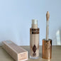 Charlotte, correttore, fondotinta liquido e cipria fissante, a lunga tenuta, controllo dell’oleosità, resistente all’acqua, facile da usare, Tilbury Cosmetics.
