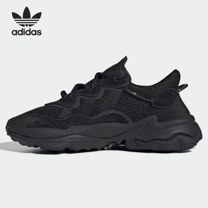 Adidas Originals OZWEEGO 'Black Warrior', sneakers casual retrò in rete, modello interamente nero, EE7775.