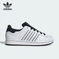 Sneakers classiche adidas Originals Shell Toe bianche e nere con colorblock, scarpe sportive casual KI9521