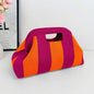 Nuova borsa intrecciata traforata a righe, borsa a mano in maglia, versatile borsa portatile per cosmetici
