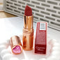 Charlotte, lucidalabbra al gusto di frutta, blush in polvere colorata, stick, tubetto rosa e oro, rossetto facile da applicare, Tilbury Cosmetics.
