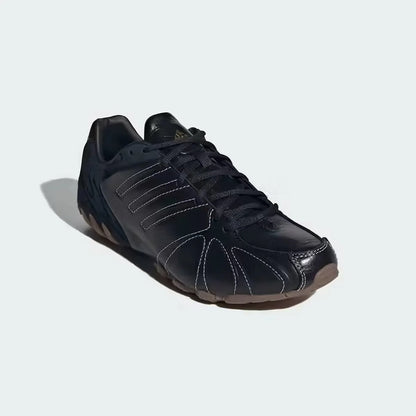 Sneakers vintage alla moda Adidas Retro con motivo a conchiglia, nere con cuciture bianche e suola in gomma IH1654