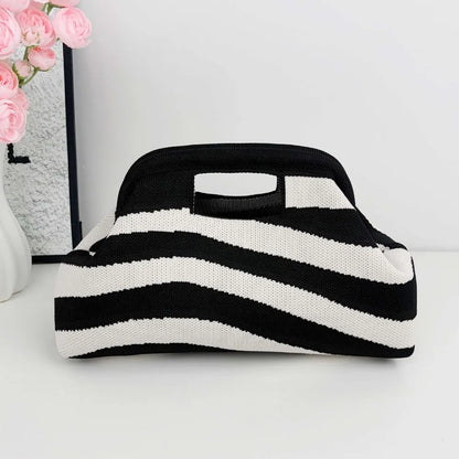 Nuova borsa intrecciata traforata a righe, borsa a mano in maglia, versatile borsa portatile per cosmetici