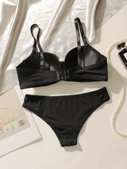 Nuovo set da 2 pezzi quotidiano in tinta unita di vendita calda con reggiseno push up con bordo in acciaio per set intimo donna J2611