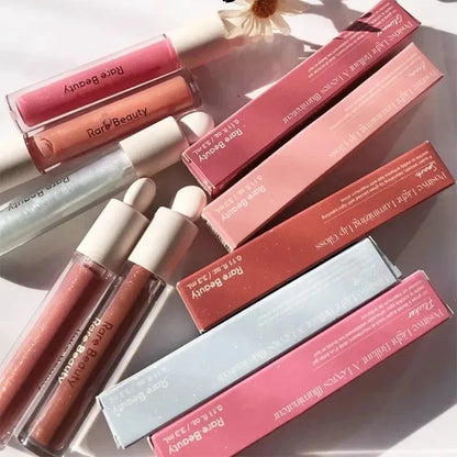 Balsamo per labbra multicolore in stick, blush liquido in polvere, linea di cosmetici Rare Beauty, Believe Happy Bliss, a lunga tenuta, facile da applicare, per un trucco impeccabile.