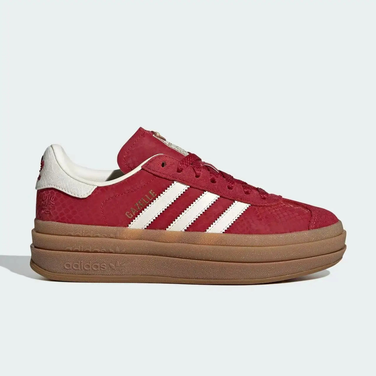 Sneakers Adidas Edizione Capodanno, stampa serpente color rosso vino con triple strisce bianche, scarpe con plateau JQ5977