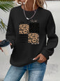 Maglione da donna, ideale per l’autunno e l’inverno, dal taglio ampio e confortevole, con stampa a motivi felini, scollo rotondo e maniche lunghe.