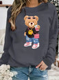Maglione da donna, modello casual per l’autunno e l’inverno, ampio e comodo, caldo, con stampa a tema cartone animato, scollo rotondo e maniche lunghe.