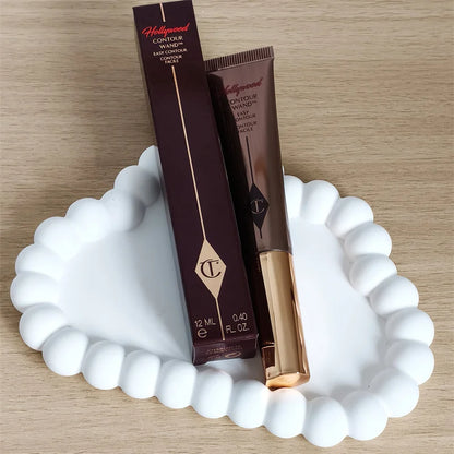 Charlotte Tilbury Highlight Spotlight Brightening Air Cushion Pen, Penna Illuminante in Polvere Cosmetica ad Alta Lucentezza, Blush Air Cushion Pen Star Makely